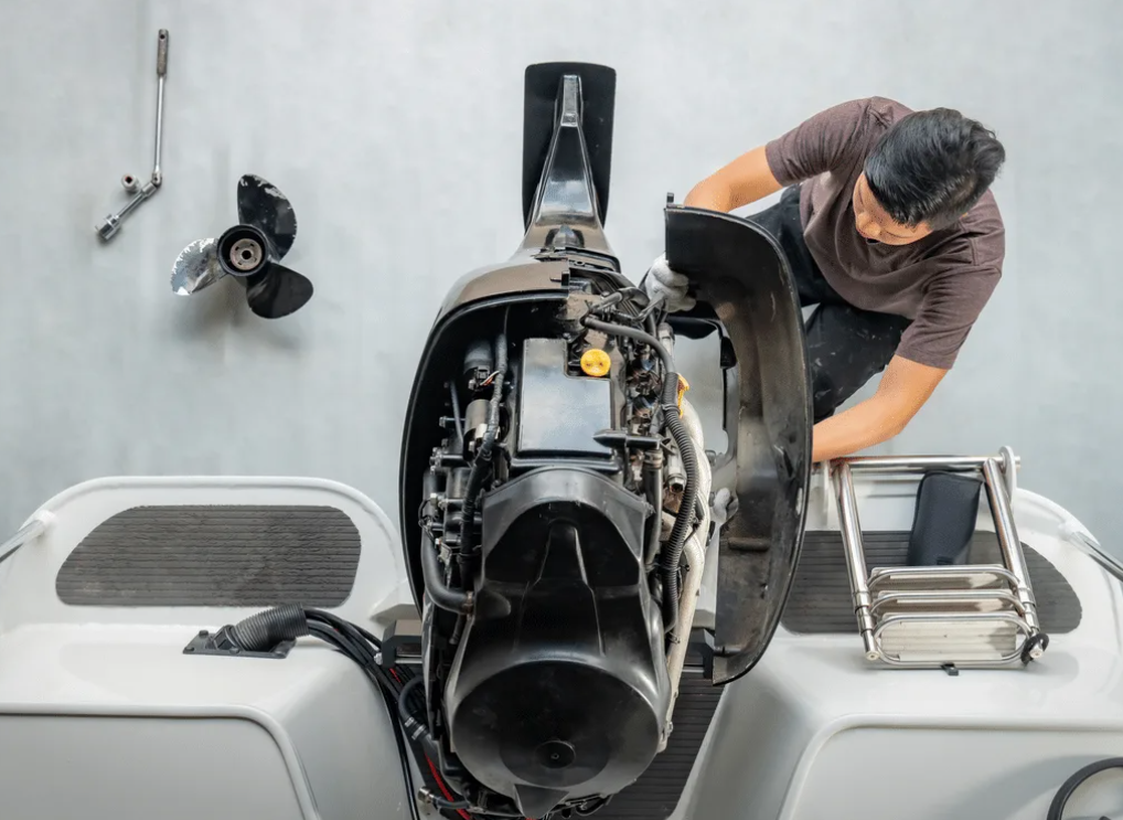 technician inspecting engine
